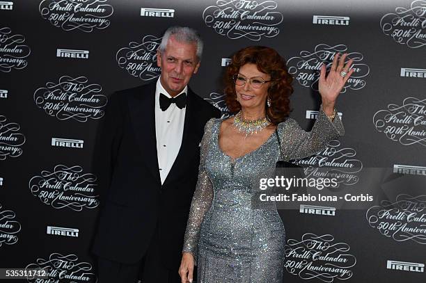 Marco Tronchetti Provera and Sophia Loren attend the Pirelli Calendar 50th Anniversary event on November 21, 2013 in Milan, Italy