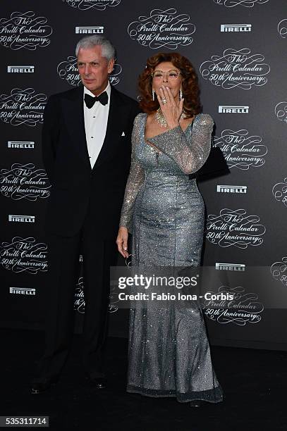 Marco Tronchetti Provera and Sophia Loren attend the Pirelli Calendar 50th Anniversary event on November 21, 2013 in Milan, Italy