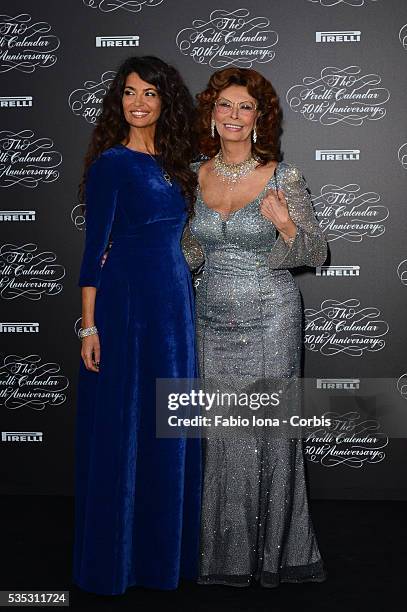 Afef Jenin and Sophia Loren attend the Pirelli Calendar 50th Anniversary event on November 21, 2013 in Milan, Italy