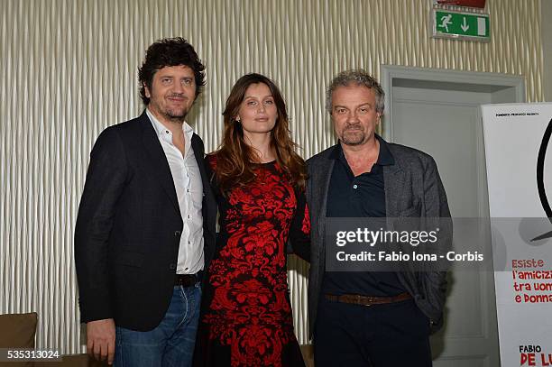 Fabio De Luigi, Laetitita Casta and Giovanni Veronesi attend 'Una Donna Per Amica' Photocall on February 25, 2014 in Milan, Italy