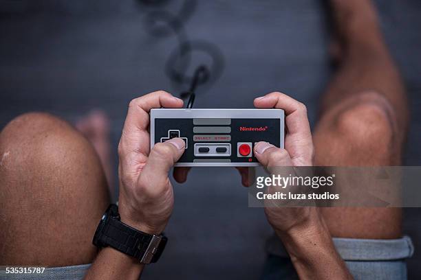 nintendo entertainment system - video game controller - nintendo stock pictures, royalty-free photos & images
