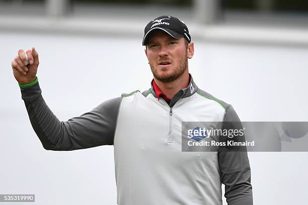 Chris Wood of England celebrates victory on the 18th green during day four of the BMW PGA Championship at Wentworth on May 29, 2016 in Virginia...