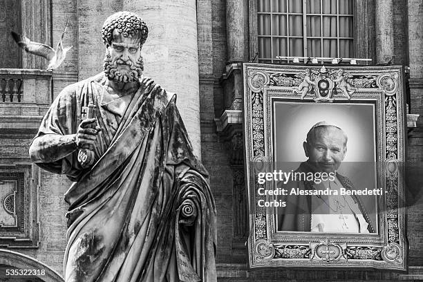 The tapestry depicting John Paul II is seen in St. Peter's Square one day before the canonoization of John Paul II and John XXIII at the Vatican. The...