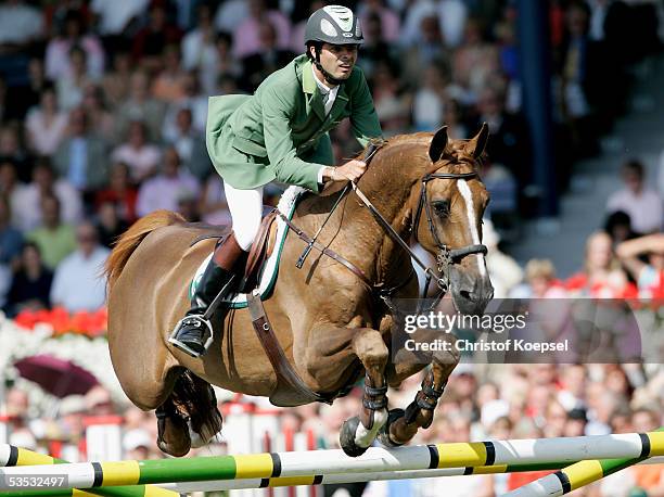 Rodrigo Pessoa of Brazil jumps on Baloubet du Rouet in the discipline of show jump of the S16 Great Pirce of Aachen during the CHIO Aachen 2005 Grand...