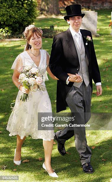 The bride Christabel McEwen and son Jack Lampton arrive at St James's Church on August 30, 2005 in Cooling, England. The Archbishop Of Canterbury, Dr...