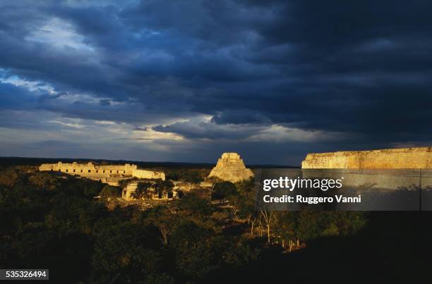 the archaeological site of uxmal, mexico, at sunset - uxmal fotografías e imágenes de stock