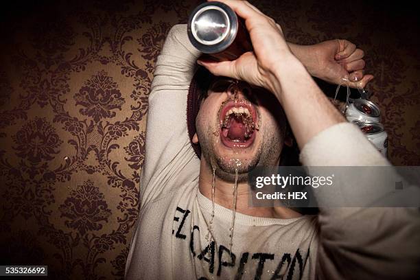 young man enjoying a night out - drunk stockfoto's en -beelden