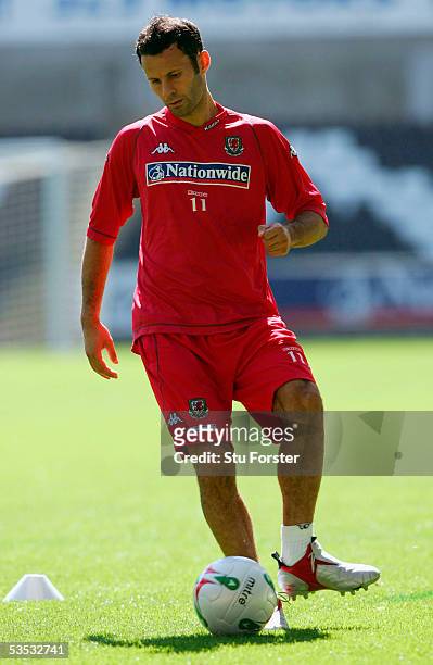 Welsh winger Ryan Giggs controls the ball during Wales training at The New Stadium, on August 30, 2005 in Swansea, Wales.