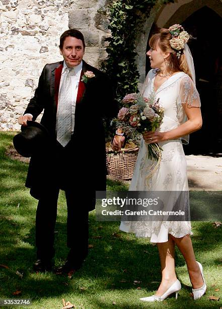 Musician Jools Holland and Christabel McEwen are seen after their wedding at St James's Church, Cooling on August 30, 2005 in Cooling, England. The...