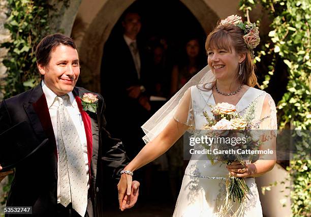 Musician Jools Holland and Christabel McEwen at St James's Church, Cooling on August 30, 2005 in Cooling, England. The Archbishop Of Canterbury, Dr...