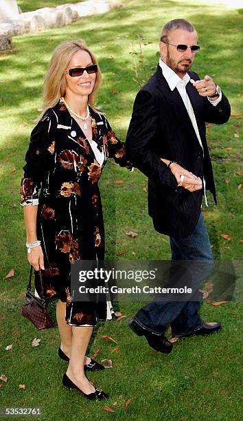 Musician Ringo Starr with wife Barbara Bach attends the wedding of musician Jools Holland and Christabel McEwen at St James's Church, Cooling on...