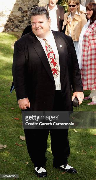 Actor Robbie Coltrane attends the wedding of musician Jools Holland and Christabel McEwen at St James's Church, Cooling on August 30, 2005 in...