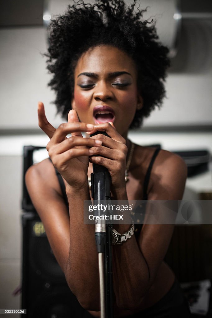 Musician rehearses in studio