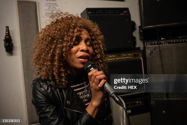 singer performing in a recording studio - soul music stock pictures, royalty-free photos & images