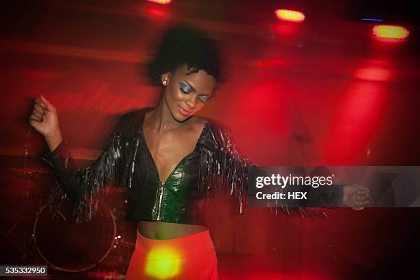 young woman enjoying a night out - 20 years old dancing stock pictures, royalty-free photos & images