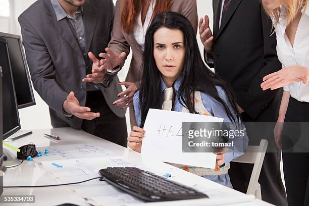 mobbing at work - help me sign - workplace bullying stock pictures, royalty-free photos & images