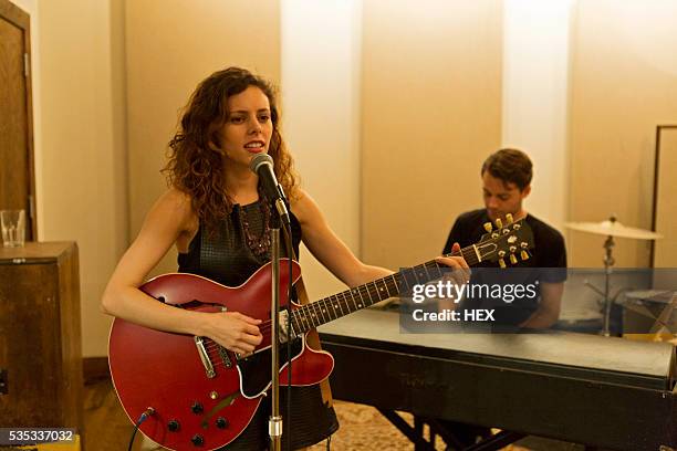 young musicians rehearsing at a studio space - practice stock pictures, royalty-free photos & images