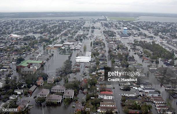 In this handout photo, Flooded neigborhoods can be seen as the Coast Guard conducts initial Hurricane Katrina damage assessment overflights August...