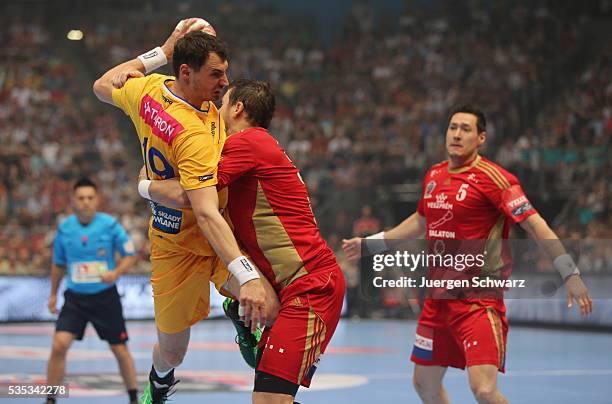 Krzysztof Lijewski of Kielce is blocked during the EHF Champions League Final between KS Vive Tauron Kielce and MKB Veszprem on May 29, 2016 in...