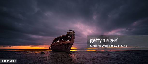 shipwreck - motueka stock pictures, royalty-free photos & images