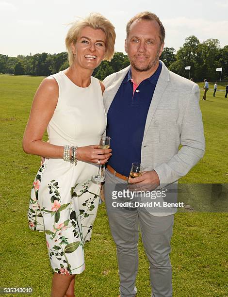 Dean Andrews and Helen Bowen-Green attend day two of the Audi Polo Challenge at Coworth Park on May 29, 2016 in London, England.