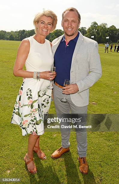 Dean Andrews and Helen Bowen-Green attend day two of the Audi Polo Challenge at Coworth Park on May 29, 2016 in London, England.