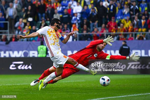 Pedro Rodriguez of Spain scores his team's third goal past Asmir Begovic of Bosnia during an international friendly match between Spain and Bosnia at...