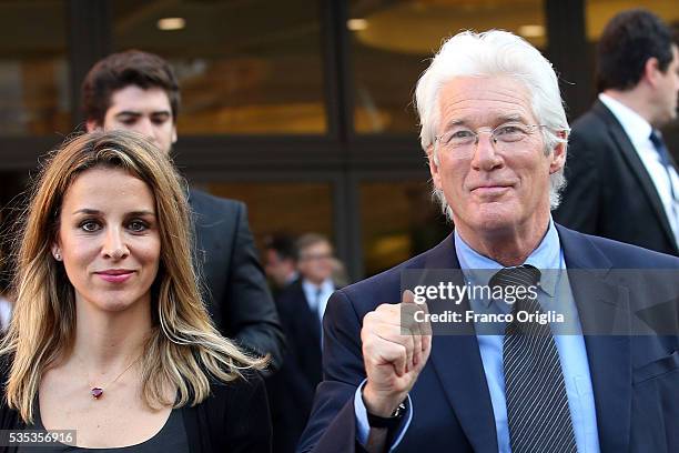 Richard Gere and his girlfriend Alejandra Silva leave at the end of 'Un Muro o Un Ponte' Seminary held by Pope Francis at the Paul VI Hall on May 29,...