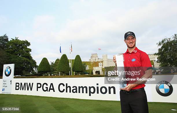 Chris Wood of England poses with the trophy following his victory during day four of the BMW PGA Championship at Wentworth on May 29, 2016 in...