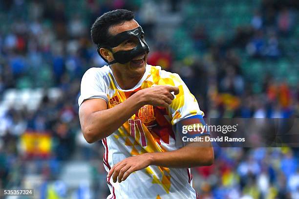 Pedro Rodriguez of Spain celebrates after scoring his team's third goal during an international friendly match between Spain and Bosnia at the AFG...