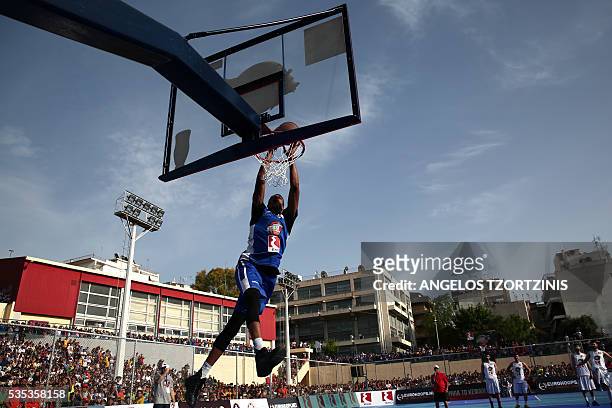Star player Giannis Antetokounmpo of the Milwaukee Bucks jumps to score during a game of streetball in Athens on May 29, 2016. The Antetokounbros...