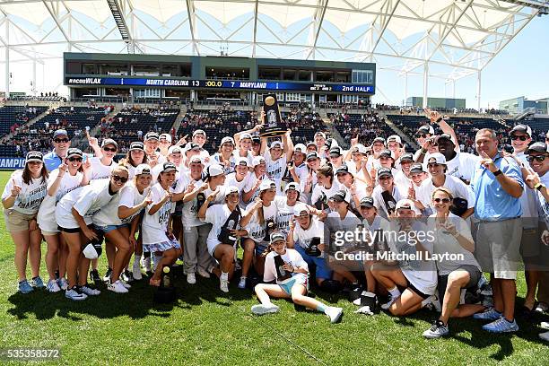 The North Carolina Tar Heels celebrate winning the NCCA Women's Lacrosse Championship game against the Maryland Terrapins at Talen Energy Stadium on...