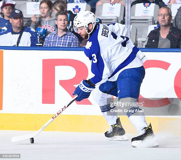 Brennan of the Toronto Marlies carries the puck up ice against the Hershey Bears during AHL Eastern Conference Final playoff game action on May 25,...