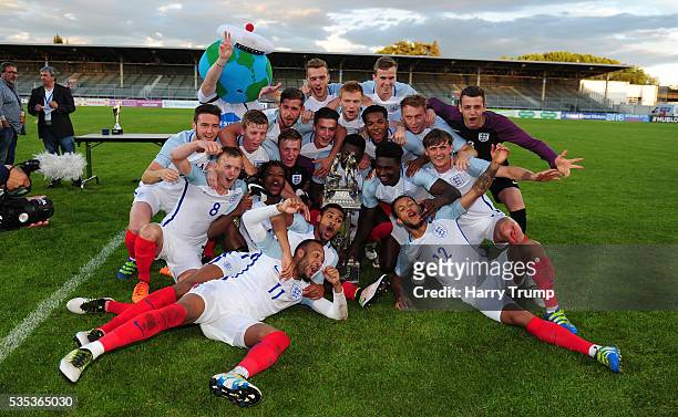 The England team celebrate after being crowned champions during the Final of the Toulon Tournament between England and France at Parc Des Sports on...