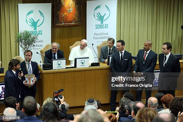 Pope Francis greets former Argentinian football players Juan Sebastian Veron and Abel Balbo attend 'Un Muro o Un Ponte' Seminary held by Pope Francis...