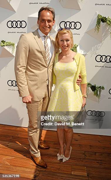 Andre Konsbruck, Director of Audi UK, and Christine Sieg attend day two of the Audi Polo Challenge at Coworth Park on May 29, 2016 in London, England.