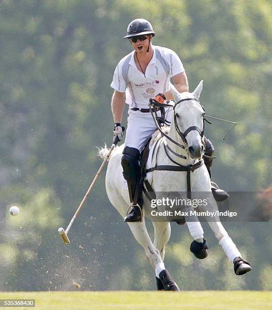 Prince Harry takes part in the Audi Polo Challenge at Coworth Park Polo Club on May 29, 2016 in Ascot, England.