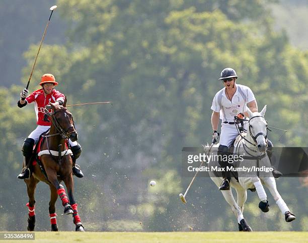 Prince Harry takes part in the Audi Polo Challenge at Coworth Park Polo Club on May 29, 2016 in Ascot, England.