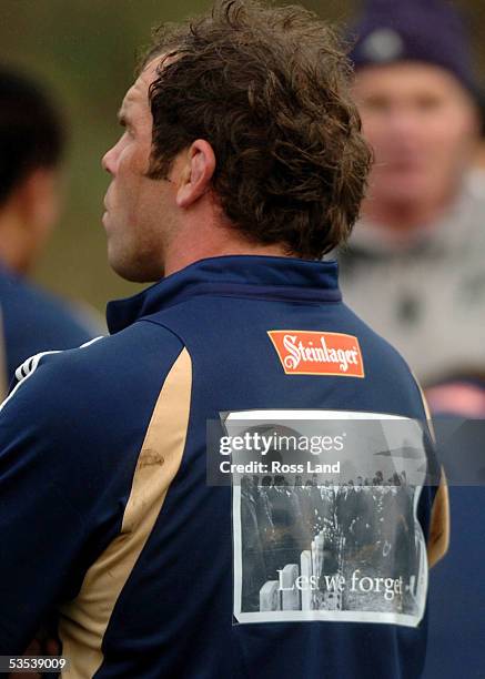 Hooker Anton Oliver wears a special shirt during training at the Cardiff Old Boys rugby Club in Cardiff, Wales, Wednesday November 17 with the words...