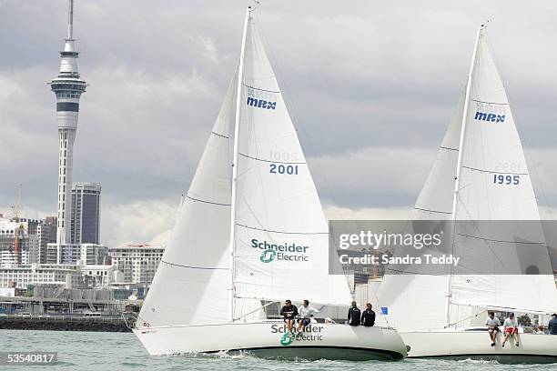 Simon Minoprio holds the lead from his brother Adam Minoprio as they sail up the Auckland Harbour, past the Sky Tower during the 2004 New Zealand...