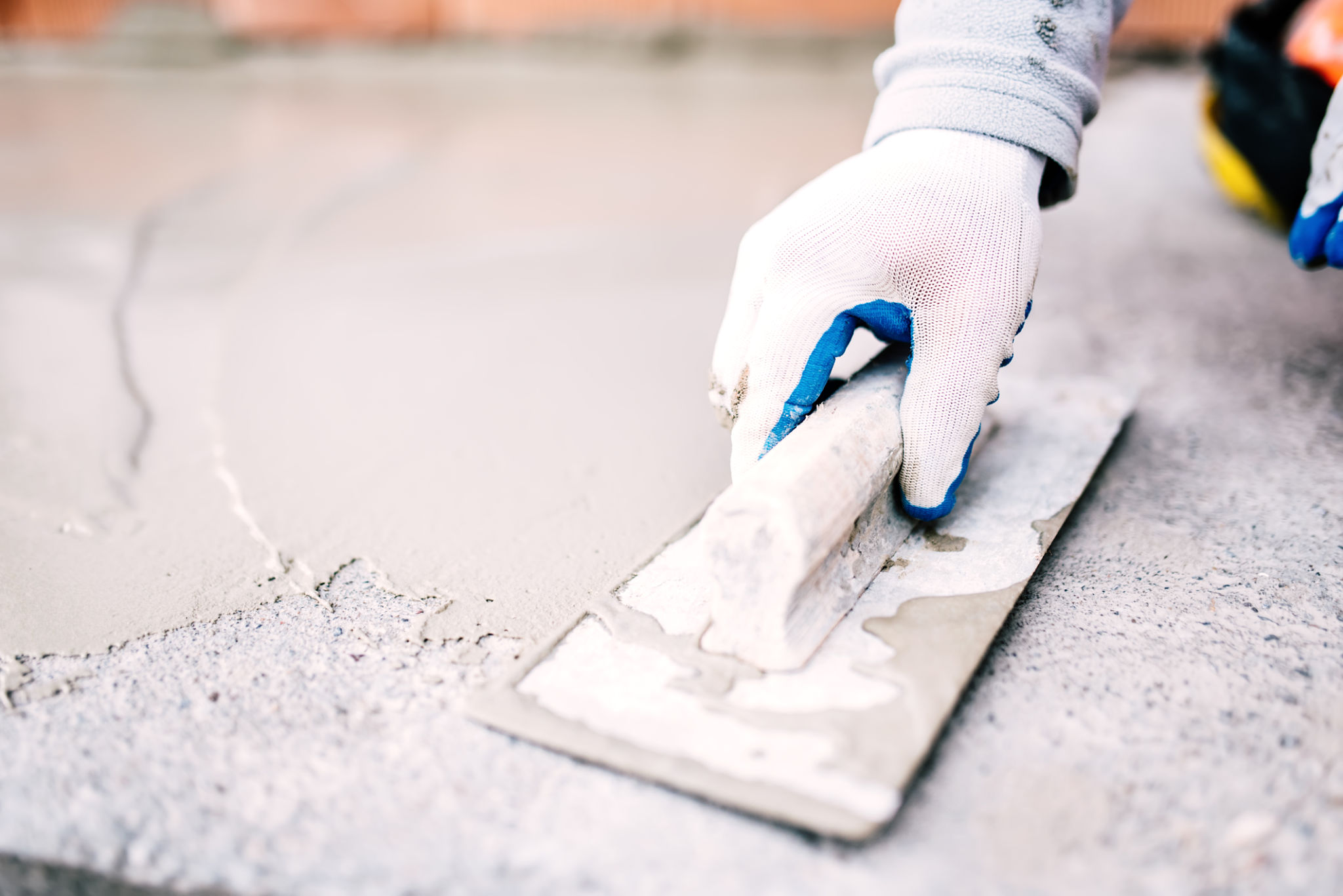 applying concrete patch