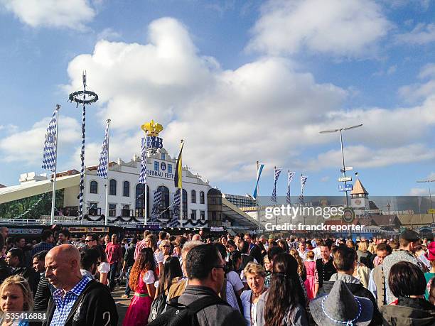 crowd at the oktober fest in munich - biergarten münchen stock pictures, royalty-free photos & images