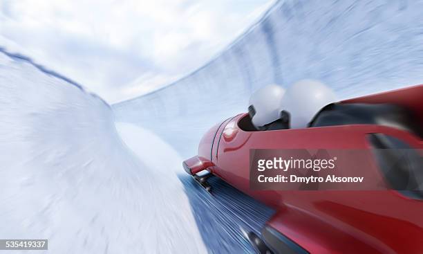 bobsleigh team - course de skeleton stockfoto's en -beelden