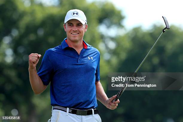 Jordan Spieth reacts to making a birdie putt on the 18th green to win the DEAN & DELUCA Invitational at Colonial Country Club on May 29, 2016 in Fort...