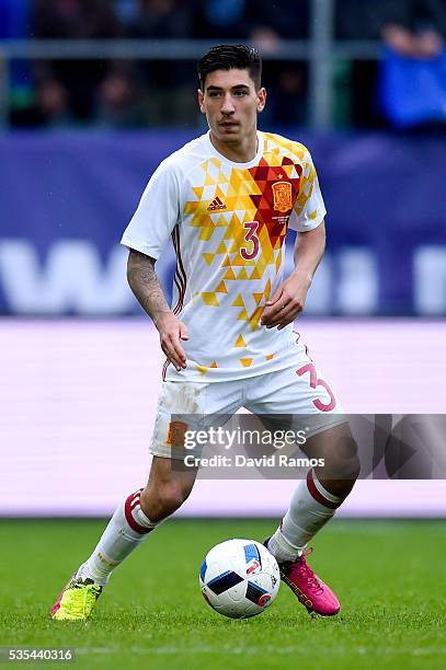 Hector Bellerin of Spain runs with the ball during an international friendly match between Spain and Bosnia at the AFG Arena on May 29, 2016 in St...