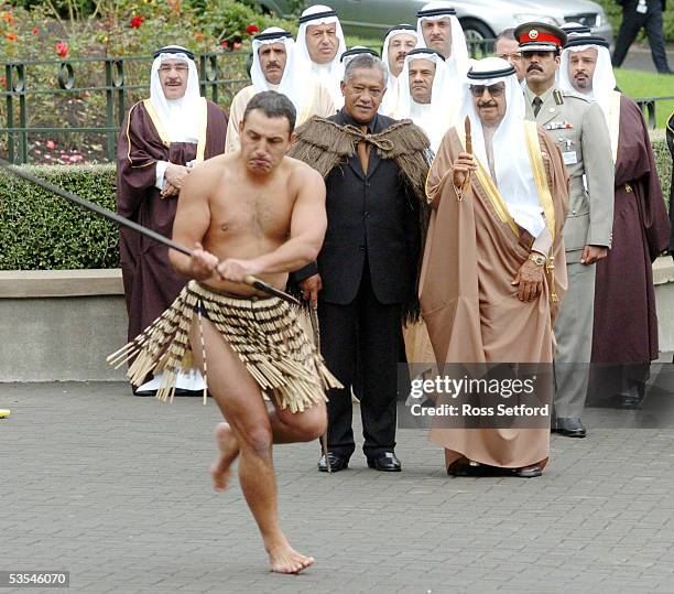 The Prime Minister of the Kingdom of Bahrain, Shiek Khalifa bin Salman Al Khalifa, right, is escorted by Kaumatua John Tahuparae, as he receives a...