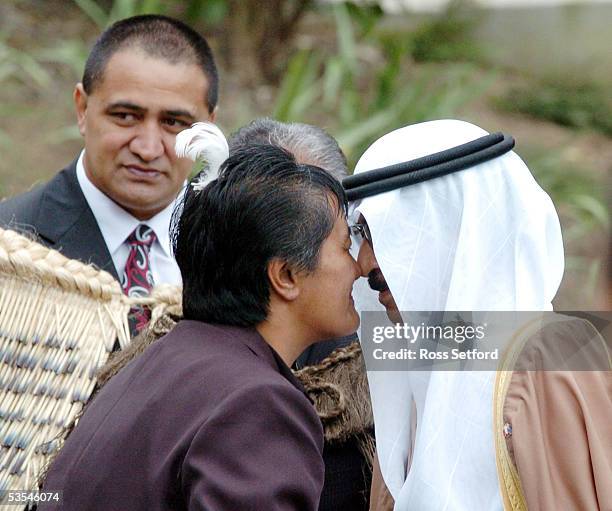 The Prime Minister of the Kingdom of Bahrain, Shiek Khalifa bin Salman Al Khalifa, right, hongis with Ngapere Moeahu of Te Ati Awa on his arrival at...