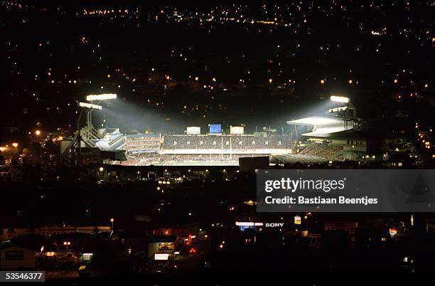 An aerial view of Eden Park at night taken during an All Blacks v Australia test match, 24th July 1999.