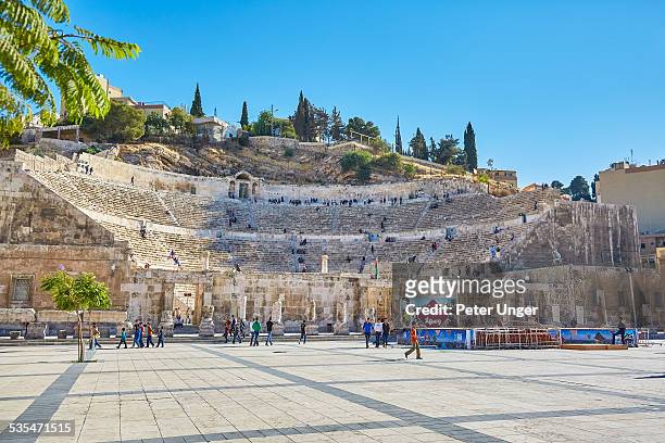 the ancient roman amphitheatre of amman - amman stock pictures, royalty-free photos & images