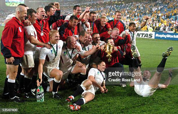 The England team celebrate with the trophy after their 2017 win over Australia in extra time in the Rugby World Cup 2003 final at the Sydney Olympic...